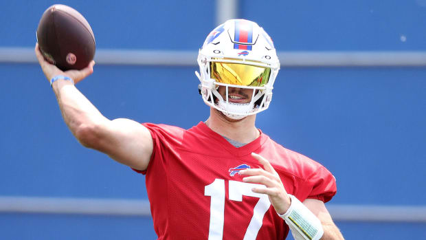 Bills quarterback Josh Allen (17) passes the ball during minicamp.